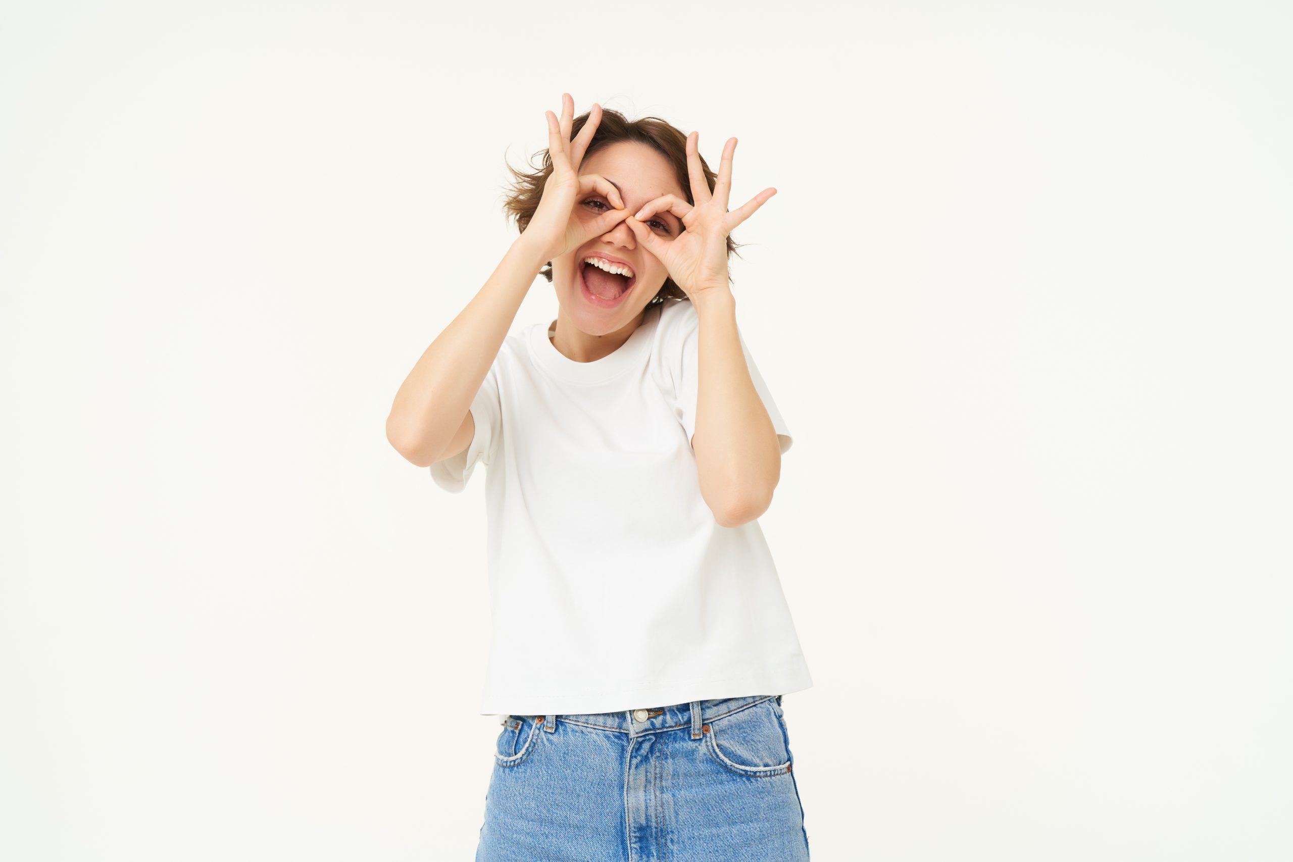 portrait carefree european woman showing glasses with hands eyes smiling posing scaled