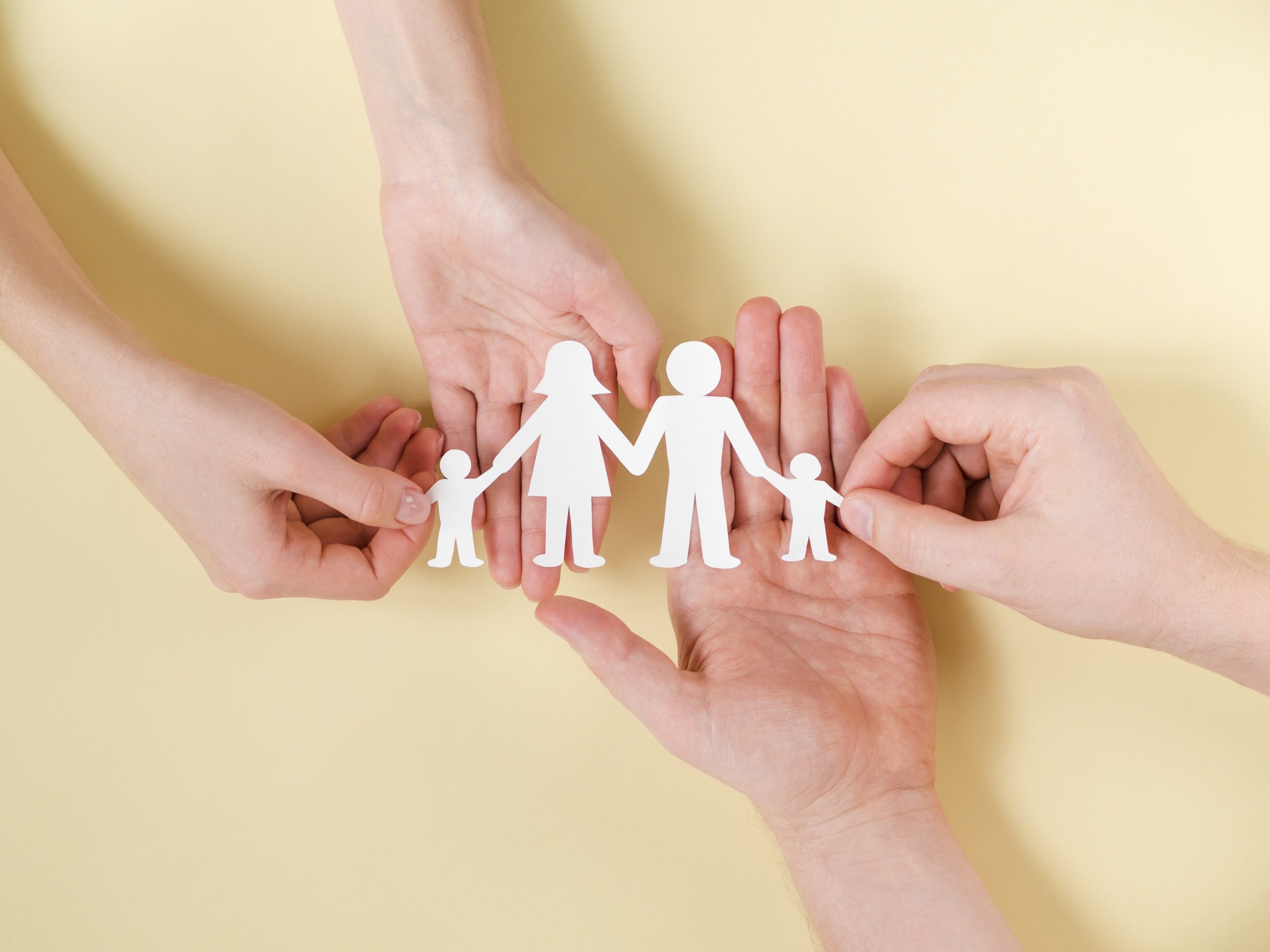 people holding together hands cute paper family scaled